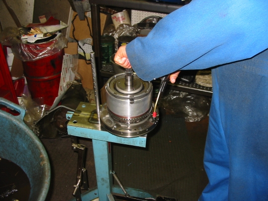 Appling air pressure to feed holes, to test for proper apply and release of each clutch pack
