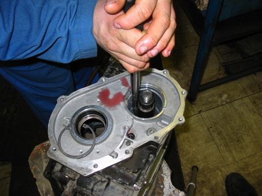 Installing pinion shaft and retainer

