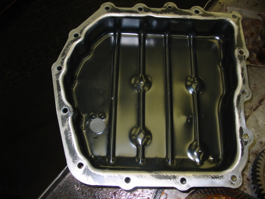 Clean oil pan and magnet
