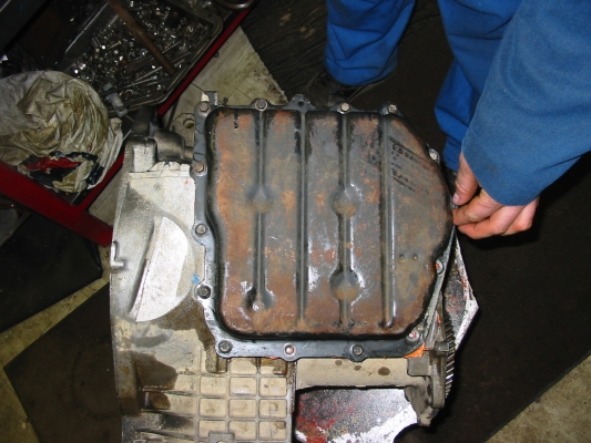 Installing oil pan
